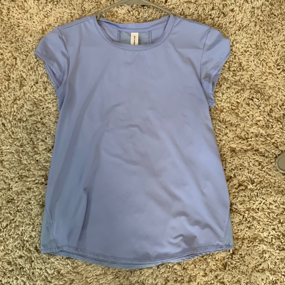 All in motion workout top. Size XS. Blue. Great condition!